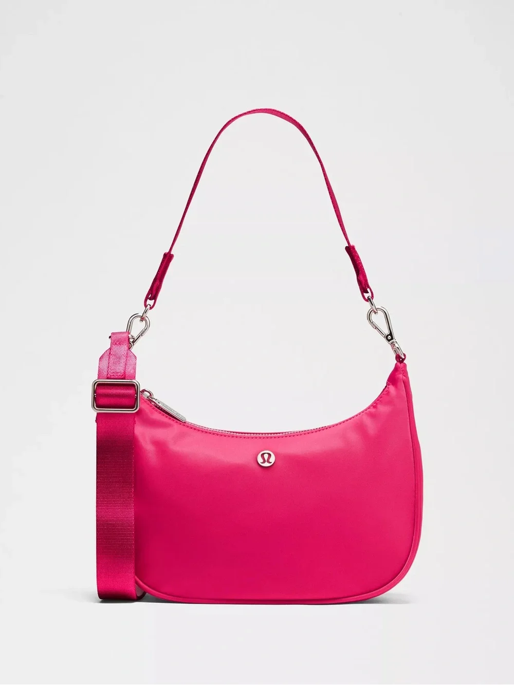 lululemon pink bag Everywhere Crossbody Belt 1L This Small Shoulder Bags Classic Shape Tucks Under Your Arm While Intentional Pockets Help You Keep It All Together lululemon - City Essentials Small